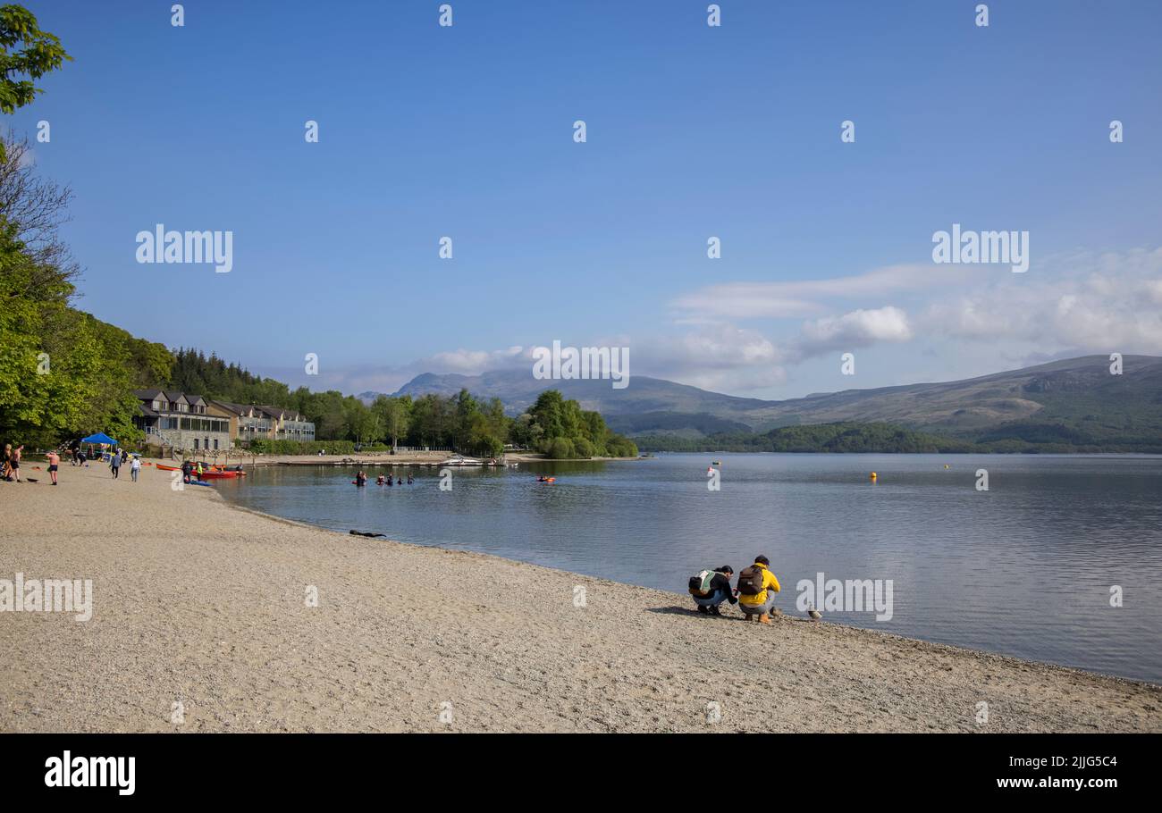 beach at the village of luss on the banks of loch lomond scotland Stock Photo