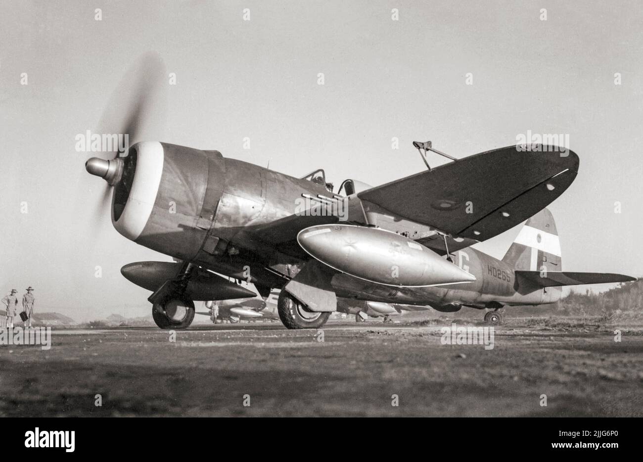 Thunderbolt Mark II of No. 30 Squadron RAF, preparing to take off for a sortie from Cox's Bazaar, India. The Republic P-47 Thunderbolt was a World War II-era fighter aircraft produced by the American aerospace company Republic Aviation from 1941 through 1945. It could  a bomb load of 2,500 lb (1,100 kg) making it one of the heaviest fighters of the war. Stock Photo