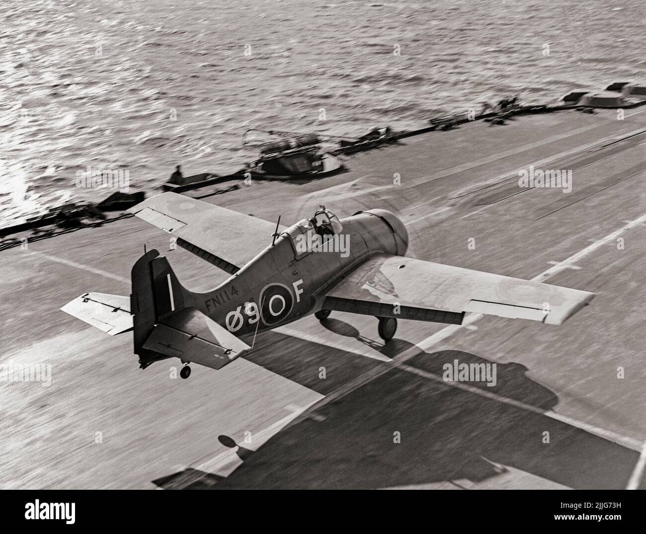 A Grumman Martlet naval fighter of No 888 Squadron Fleet Air Arm taking off from the deck of HMS Formidable in the Mediterranean. Originally called the Grumman F4F Wildcat, the American carrier-based fighter aircraft entered service in 1940 with the United States Navy, and the British Royal Navy where it was initially known as the Martlet. Stock Photo