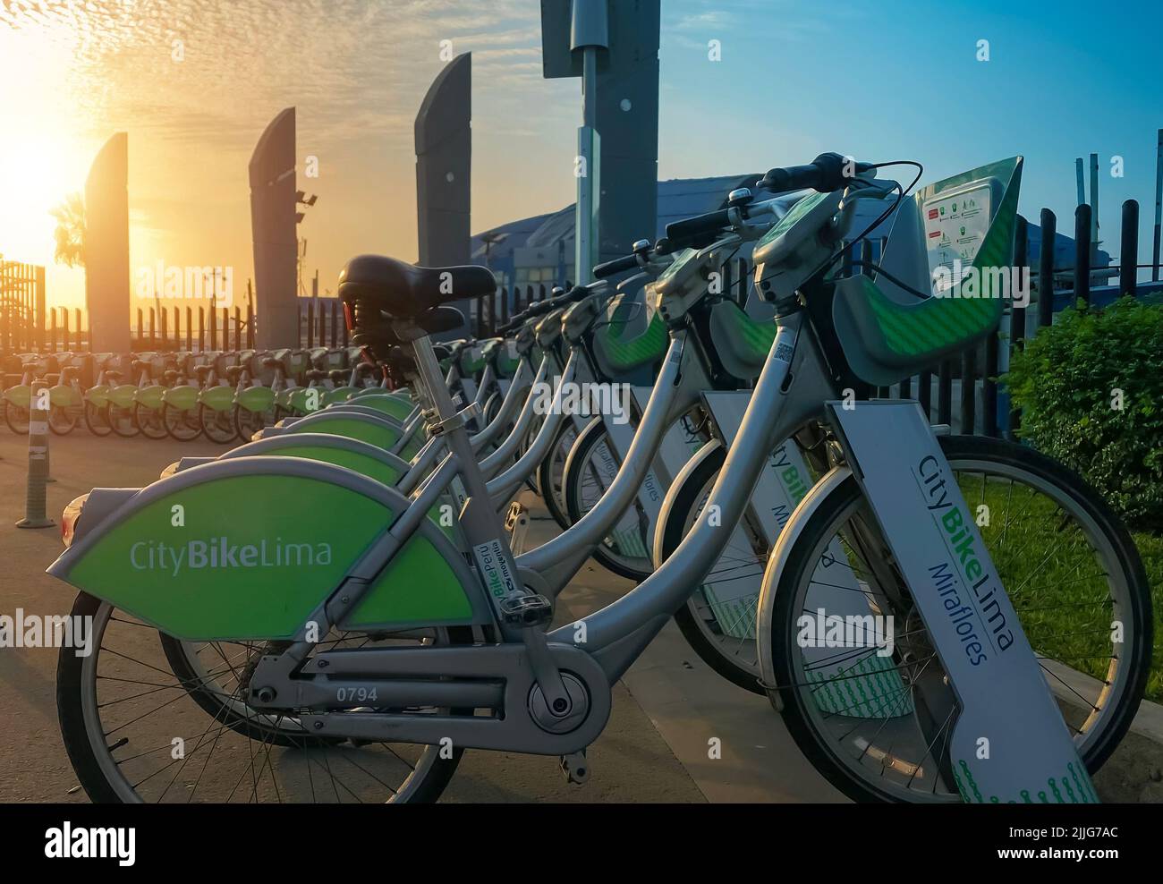 Lima, Peru, 2022. Users access the CitybikeLima rental APP at the