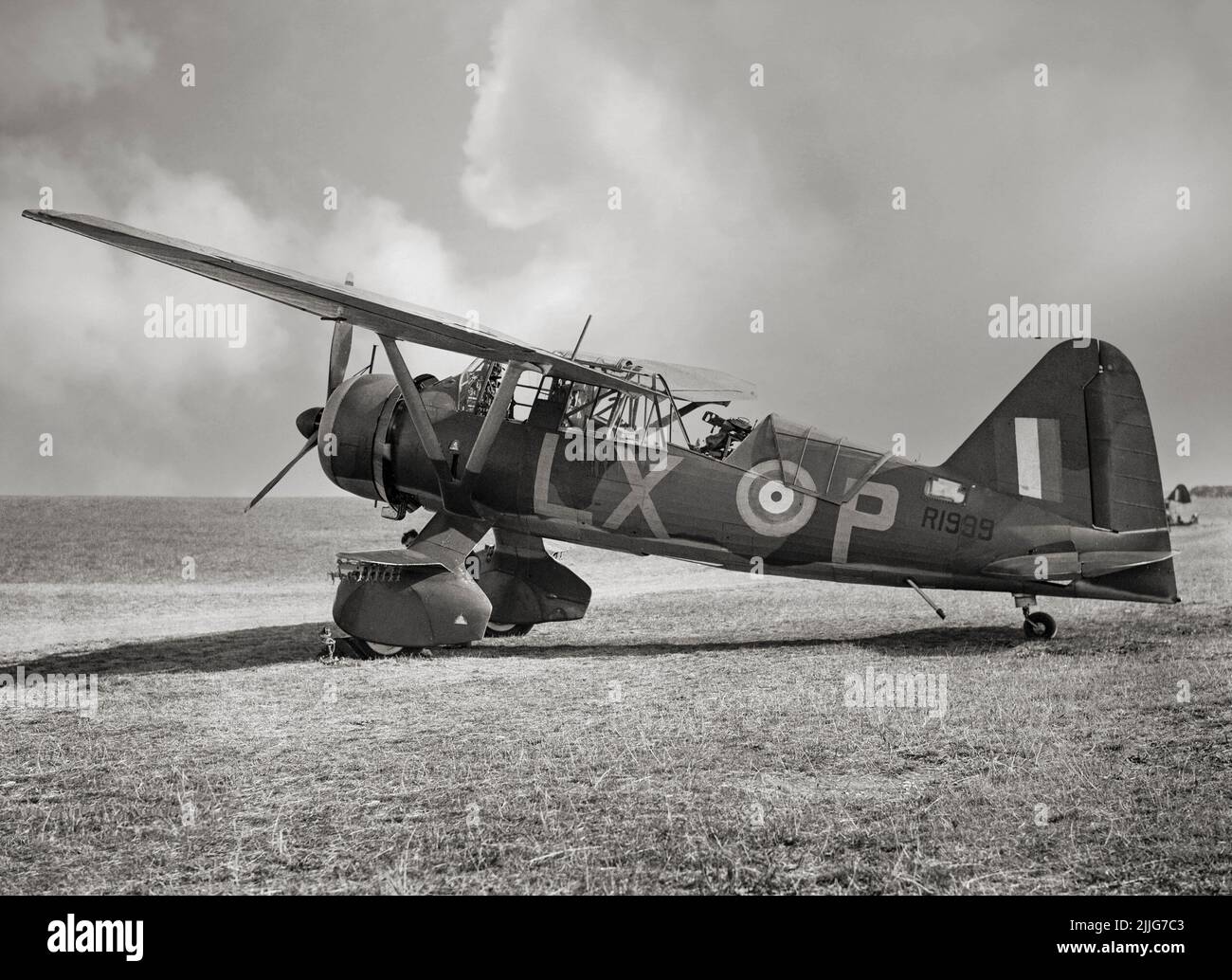 A Westland Lysander Mark II of No. 225 Squadron RAF, undergoing maintenance at Tilshead, Wiltshire. Note the single Lewis Mark III machine gun on its Fairey mounting in the rear cockpit. The aircraft was a British army co-operation and liaison aircraft used immediately before and during the Second World War. After becoming obsolete in the army co-operation role, the aircraft's short-field performance enabled clandestine missions using small, improvised airstrips behind enemy lines to place or recover agents, particularly in occupied France. Stock Photo