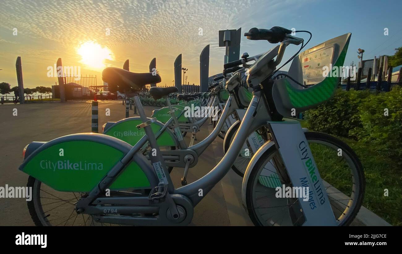 Lima, Peru, 2022. Users access the CitybikeLima rental APP at the