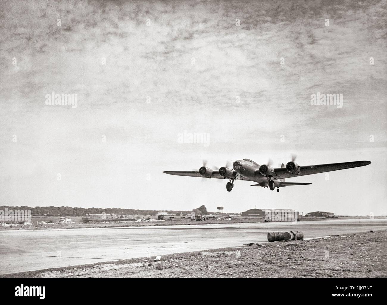 A Boeing Fortress Mark I of No. 90 Squadron RAF, taking off from Polebrook, Northamptonshire, to attack the German battlecruiser Gneisenau docked at Brest, France. Three of the Squadron's Fortresses accompanied the attacking force, bombing the vessel from 30,000 feet in an effort to draw enemy fighters from the other bombers. Stock Photo