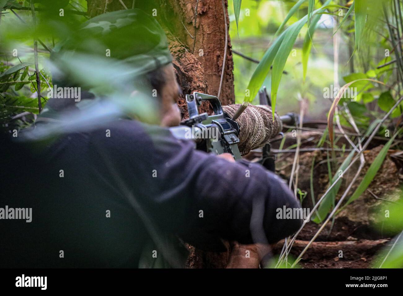 A Karenni Nationalities Defence Force (KNDF) soldier is on guard while ...