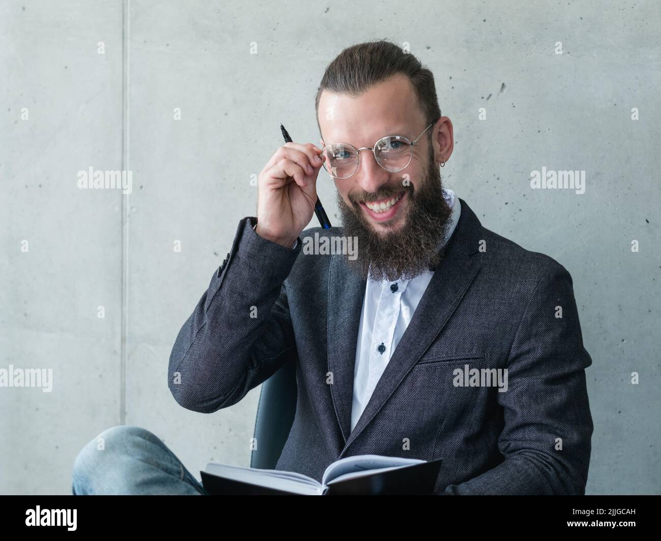 smiling professor examinator man jacket glasses Stock Photo