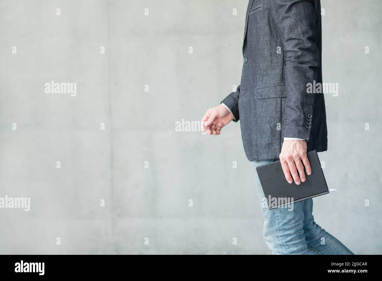 business man walking smart casual fashion style Stock Photo