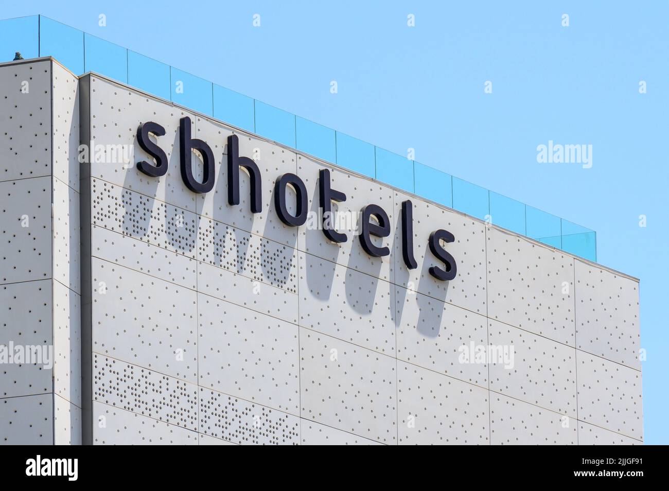 SB Hotels sign on top of a building Stock Photo