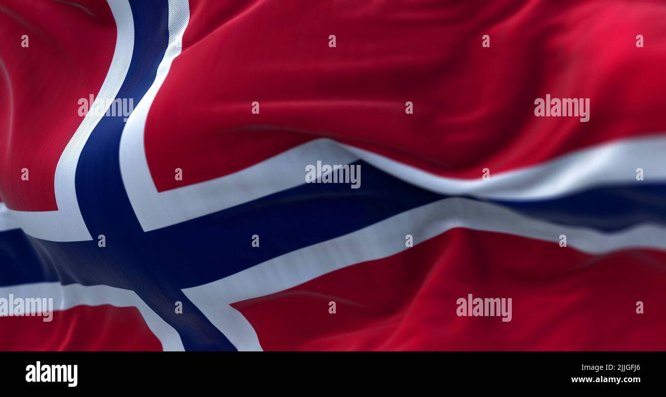 Close-up view of the Norway national flag waving in the wind. Norway is a Nordic country in Northern Europe Stock Photo