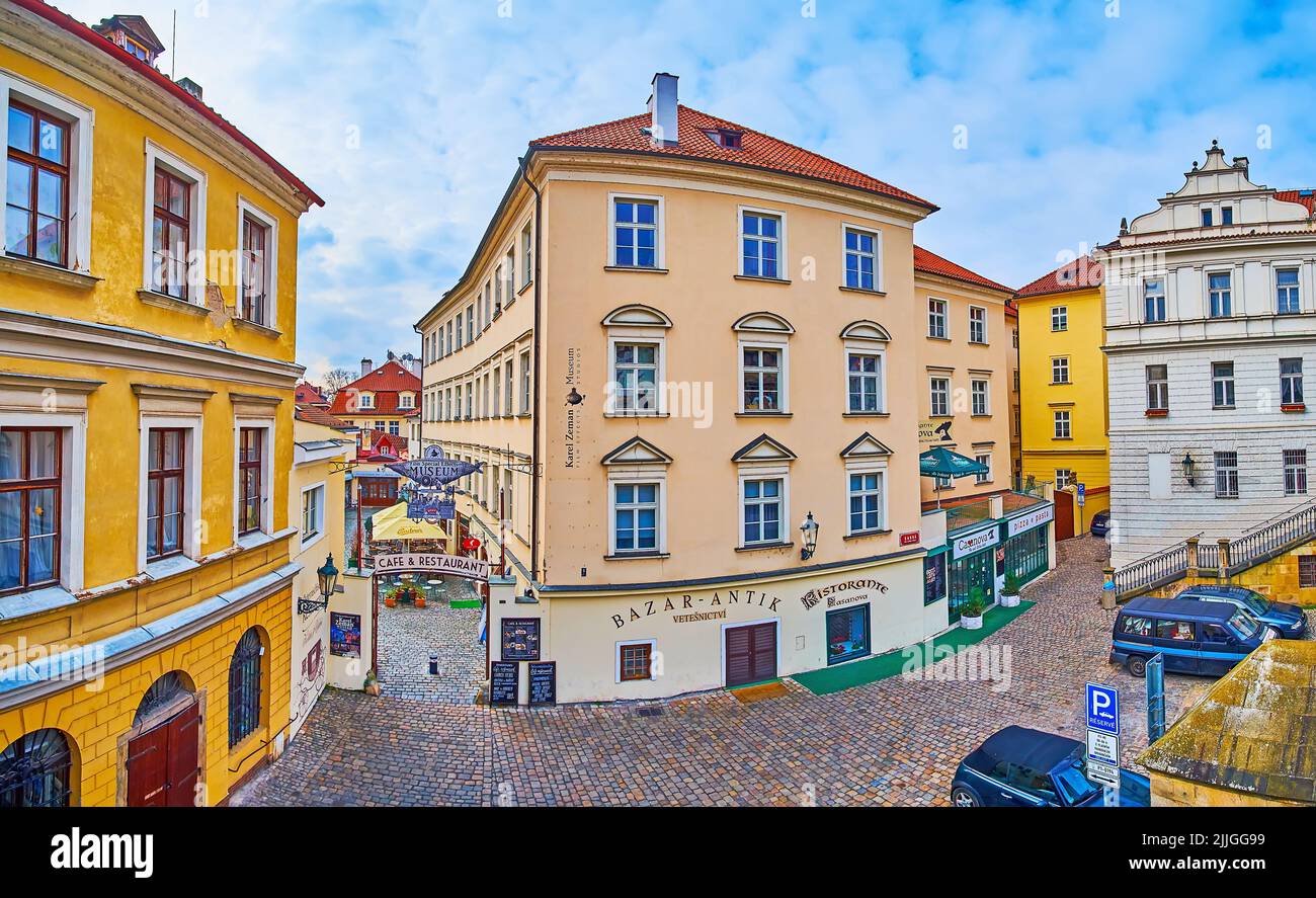 PRAGUE, CAZECH REPUBLIC - MARCH 6, 2022: The colored vintage houses of Mala Strana on Saska Street with Karel Zeman Museum and Bazar-Antik Vetesnictvi Stock Photo