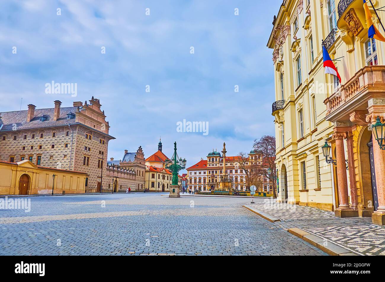 Historic palaces, decorated with sgraffito, moulding and sculptures on the Castle Square of Hradcany, Prague, Czech Republic Stock Photo