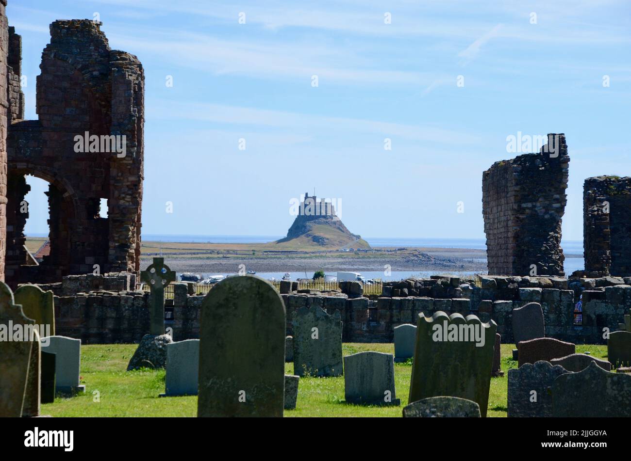 holy island lindisfarne priory castle monastry graveyard boat huts and pilgrims coffee northumberland england great britain 2022 Stock Photo