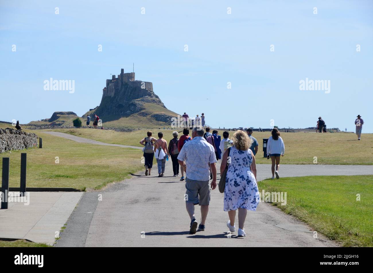 holy island lindisfarne priory castle monastry graveyard boat huts and pilgrims coffee northumberland england great britain 2022 Stock Photo