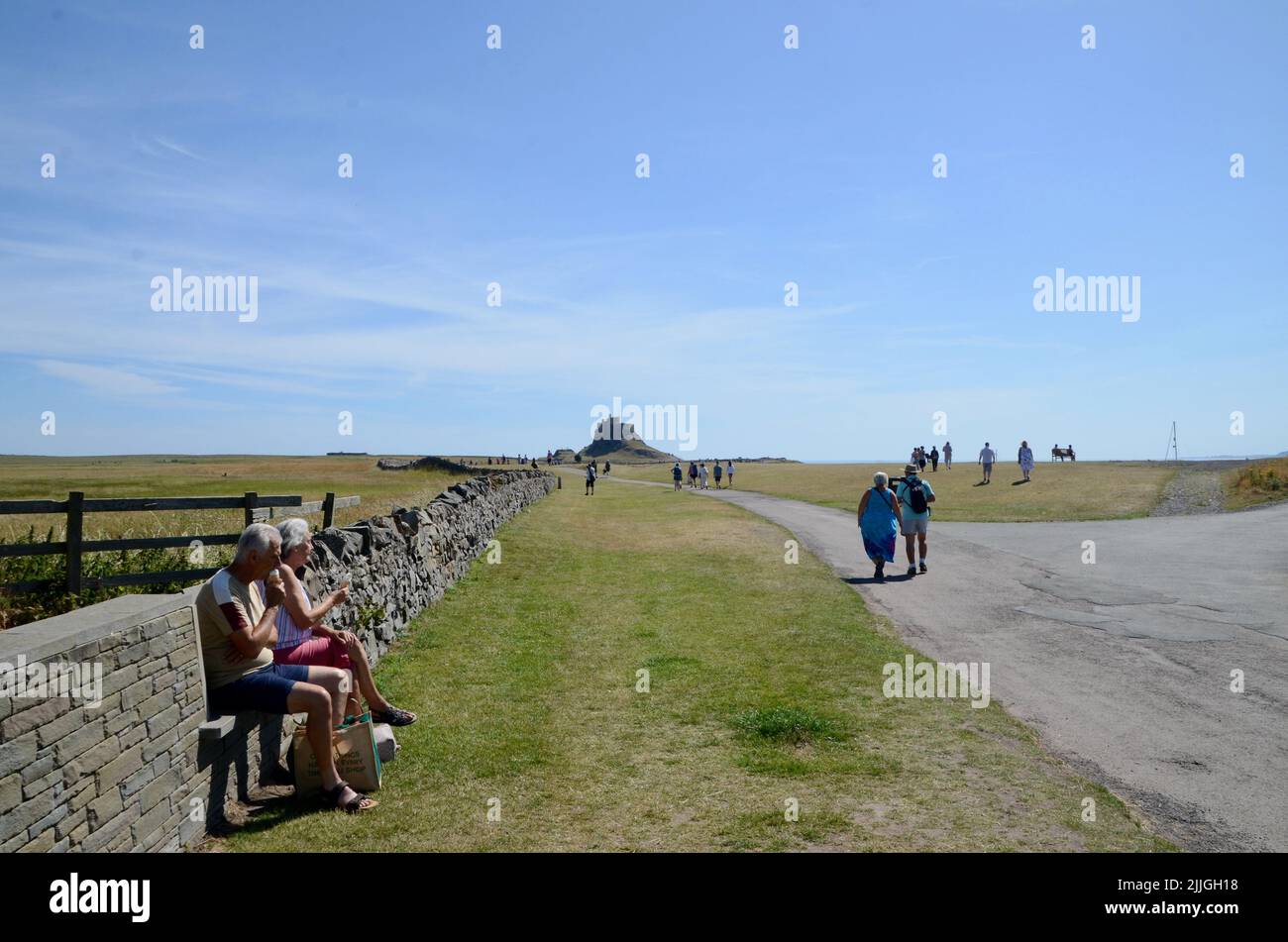 holy island lindisfarne priory castle monastry graveyard boat huts and pilgrims coffee northumberland england great britain 2022 Stock Photo