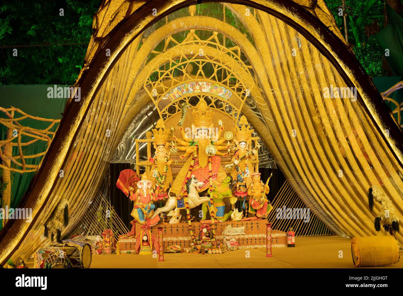 Kolkata, West Bengal, India - 12th October, 2021 : Decorated Durga idol inside pandal at night. Durga puja is Biggest festival of Hinduism. Stock Photo