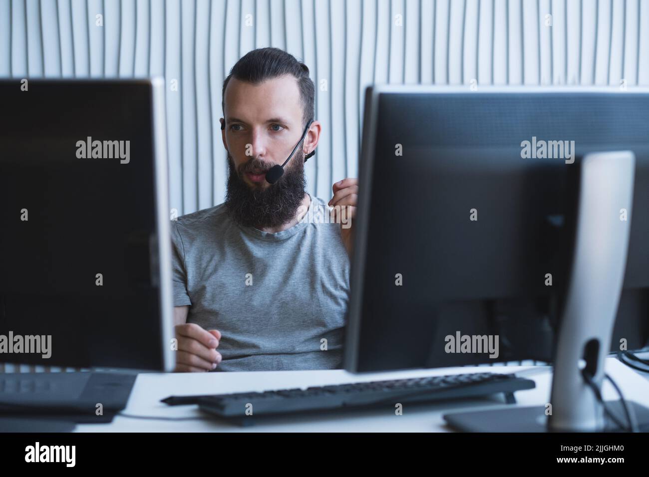 tech support software engineer customer office Stock Photo