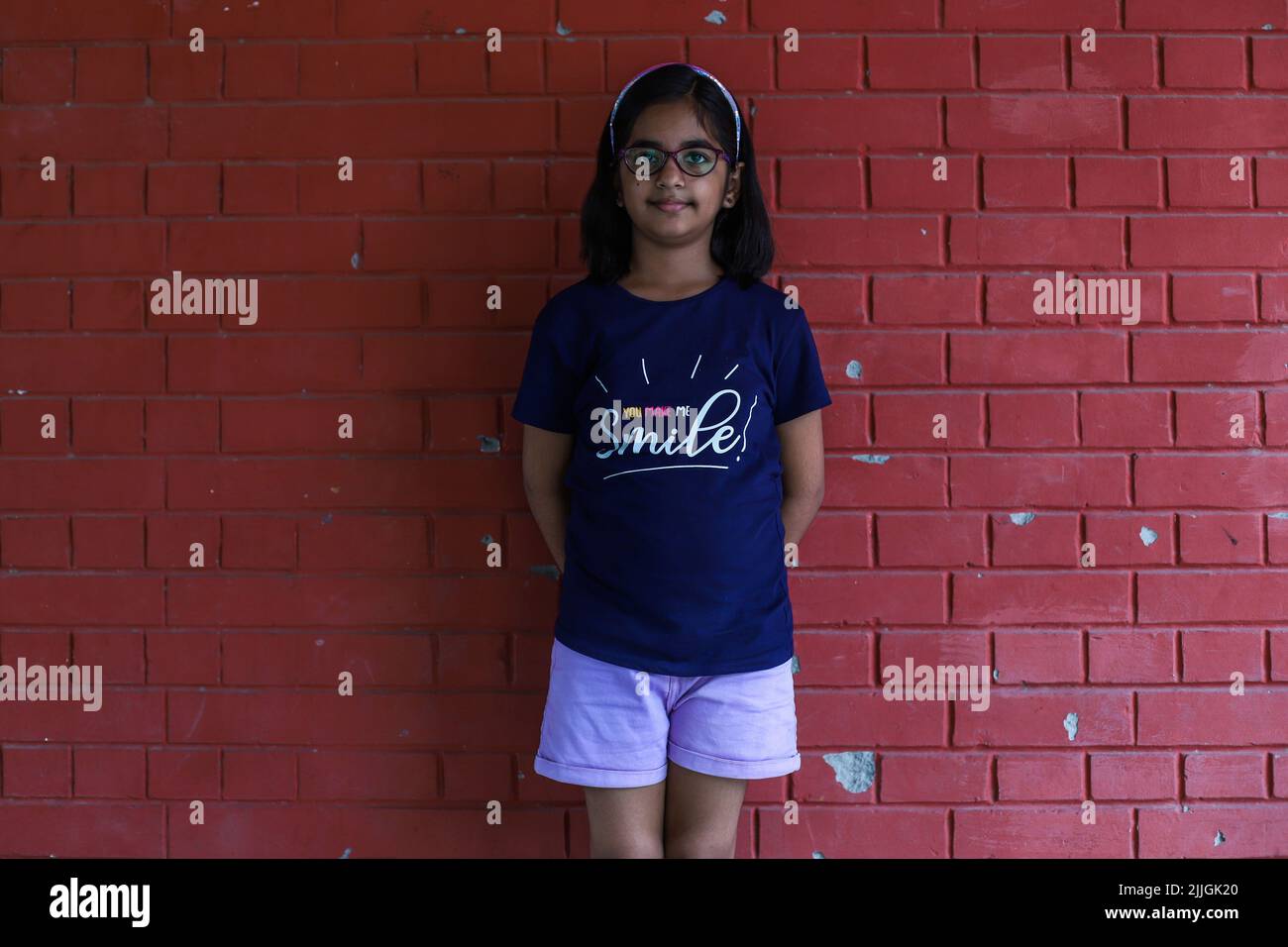 New Delhi, India. 24th July, 2022. Nandika, 8 years old, shows her hair