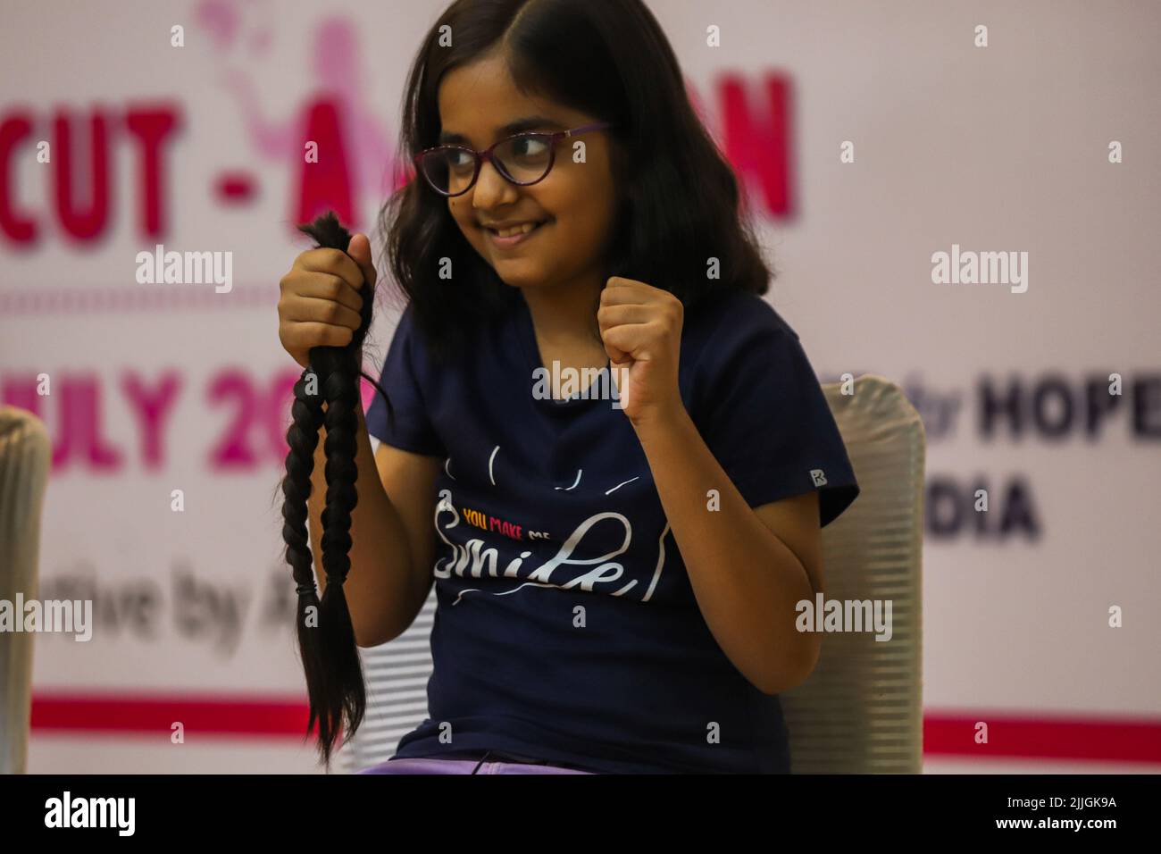 A young volunteer shows her hair locks after snipping off during a donation drive to support cancer survivors, organized by Hair for Hope India foundation's Cut-a-thon event in New Delhi. As part A young volunteer shows her hair locks after snipping off during a donation drive to support cancer survivors, organized by Hair for Hope India foundation's Cut-a-thon event in New Delhi. As part