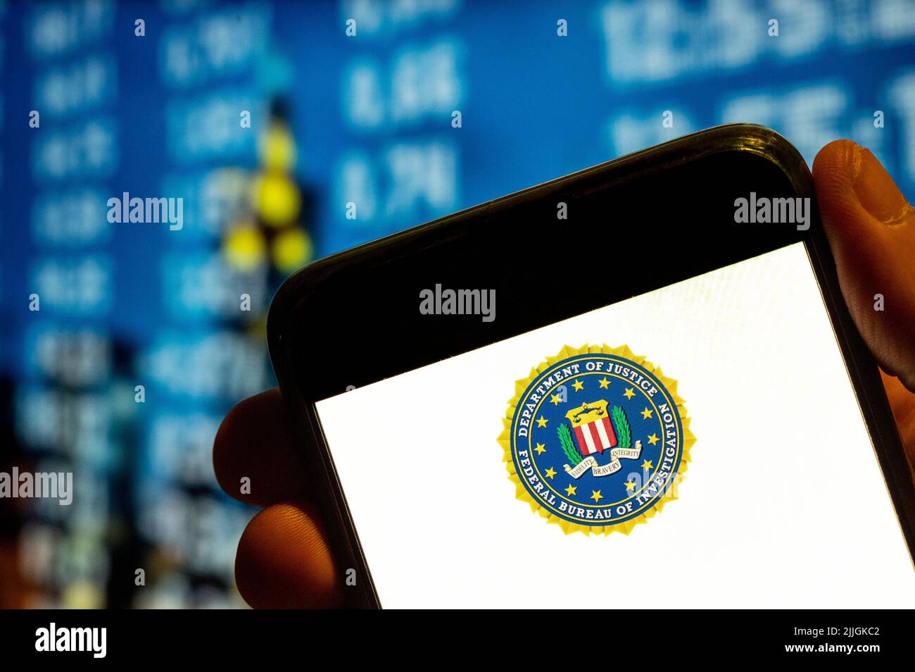 In this photo illustration, the Federal Bureau of Investigation (FBI) logo is displayed on a smartphone screen. Stock Photo