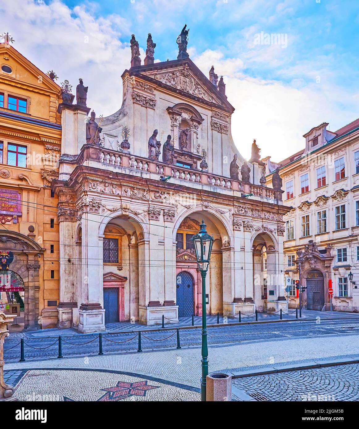 The facade of St Salvator Church with moulding, sculptures and wall