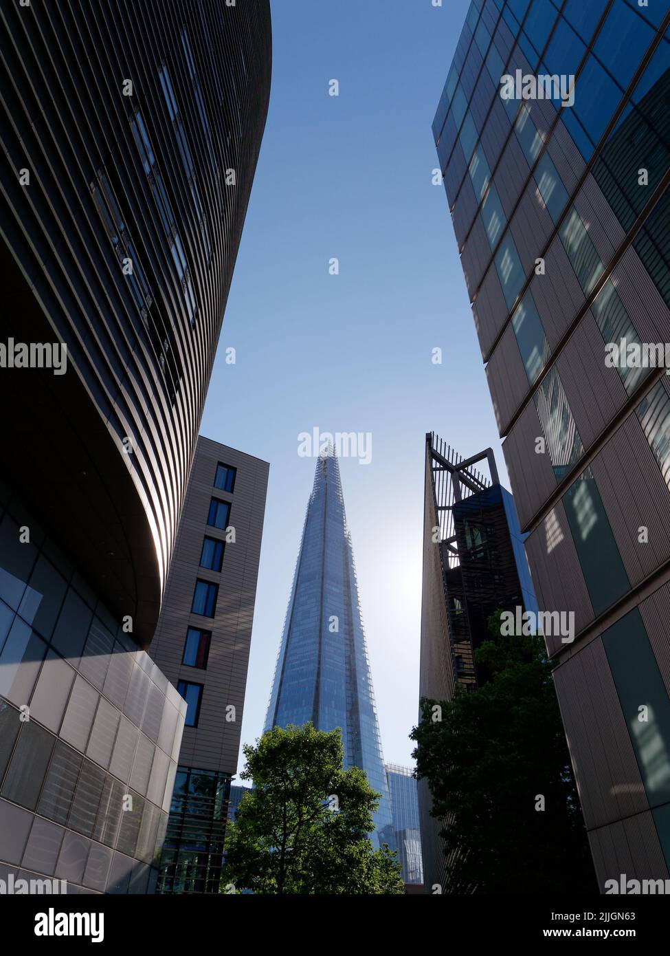 London, Greater London, England, June 22 2022: Looking through buildings on the south bank towards The Shard Skyscraper Stock Photo