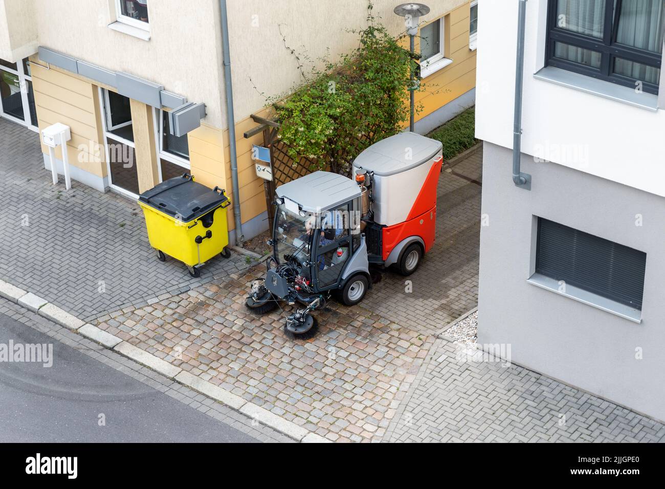 Top above view of small sweeping vacuum cleaner machine equipment