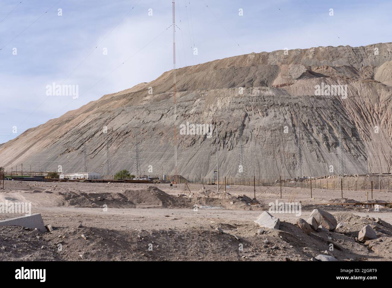 Enormous mine tailings at the huge Codelco open pit copper mine in the Atacama Desert at Chuquicamata, Chile. Stock Photo
