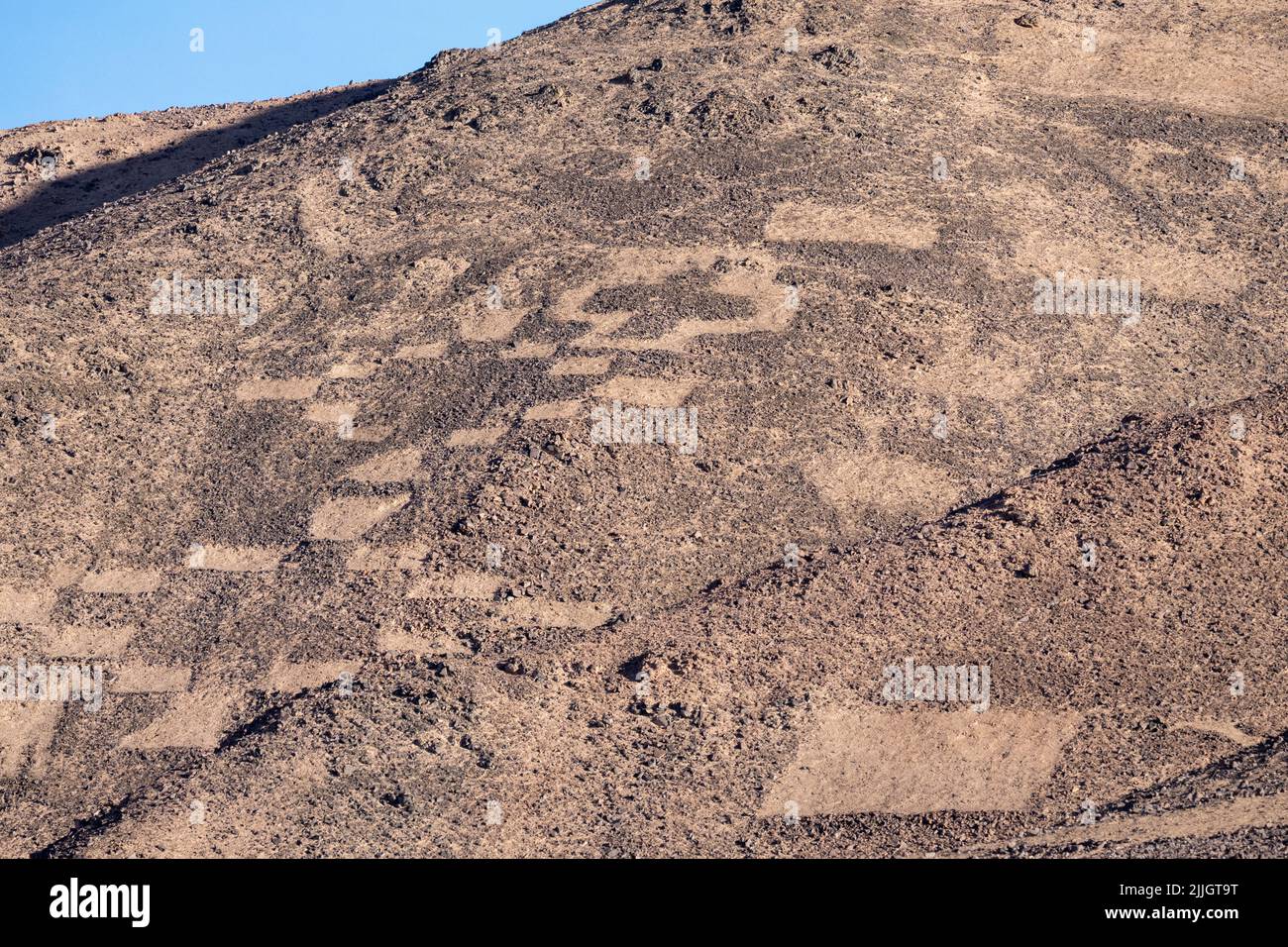 The Cerros Pintados Geoglyphs were made between 700 and 1500 A.D in the Atacama Desert of northern Chile.  They depict stylized figures of people, ani Stock Photo