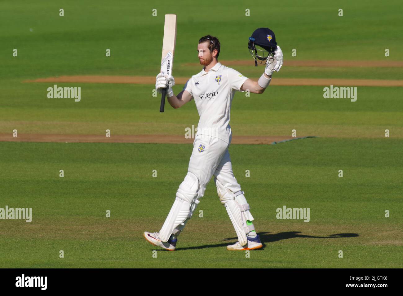 Cricket batsman raising bat hi-res stock photography and images - Alamy