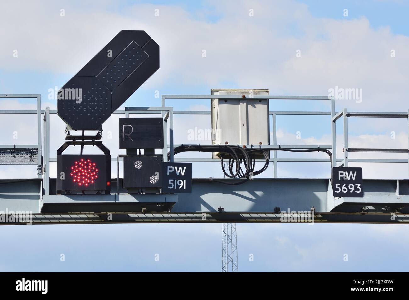 A red stop signal on a gantry at Poole station. Stock Photo