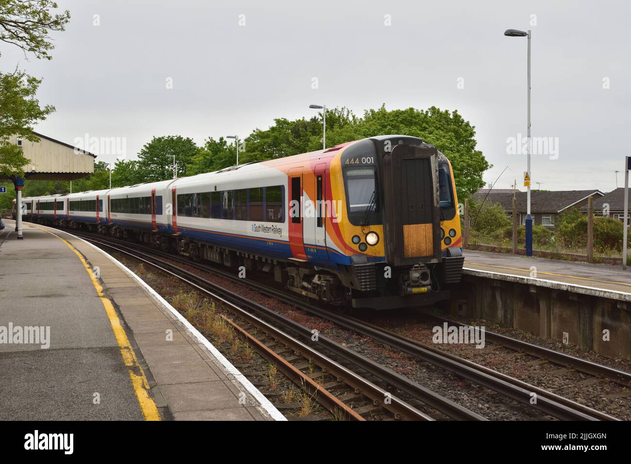 South Western Railway Class 444 Desiro electric multiple unit 444001 arrivs at Hamworthy on a Waterloo - Weymouth service on 12th May 2018. Stock Photo
