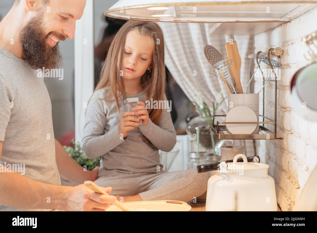 happy family father daughter cooking kitchen Stock Photo