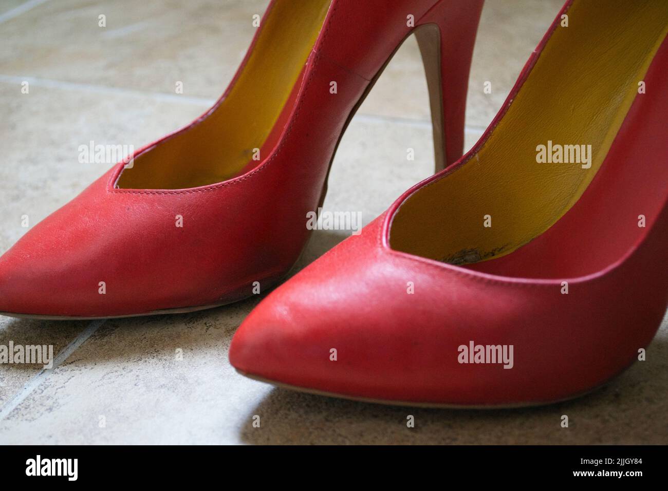 Pair of red high heels shoes Stock Photo - Alamy