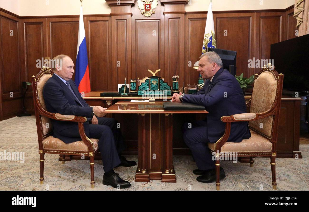 Moscow, Russia. 26th July, 2022. Russian President Vladimir Putin holds a face-to-face meeting with Director General of the Roscosmos State Space Corporation Yury Borisov, right, at the Kremlin, July 26, 2022 in Moscow, Russia. Borisov announced that Russia will end participation in the International Space Station after 2024. Credit: Mikhail Klimentyev/Kremlin Pool/Alamy Live News Stock Photo