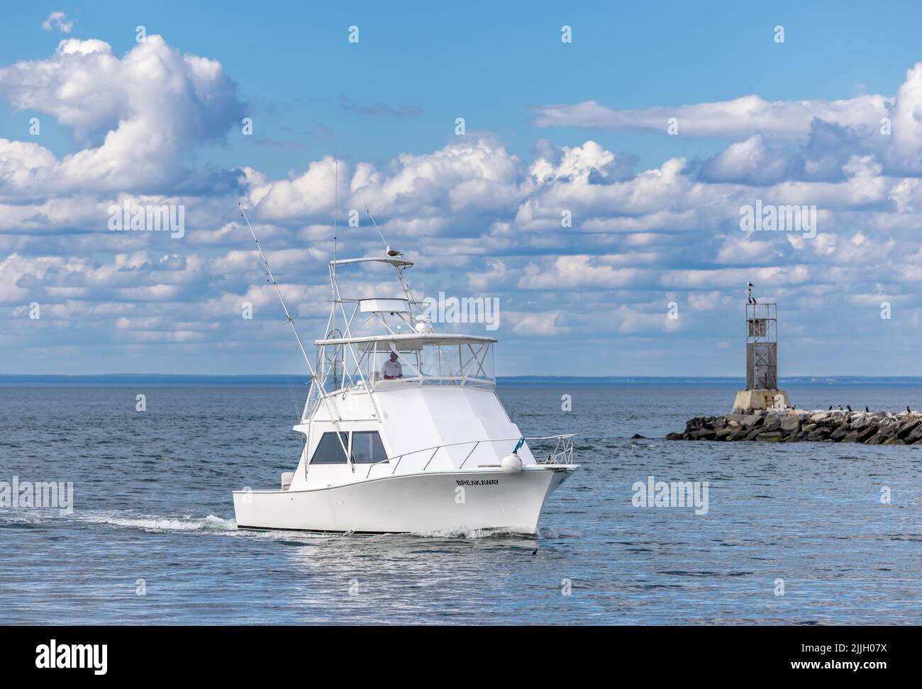 Fishing boat, Break Away coming into Montauk Harbor Stock Photo