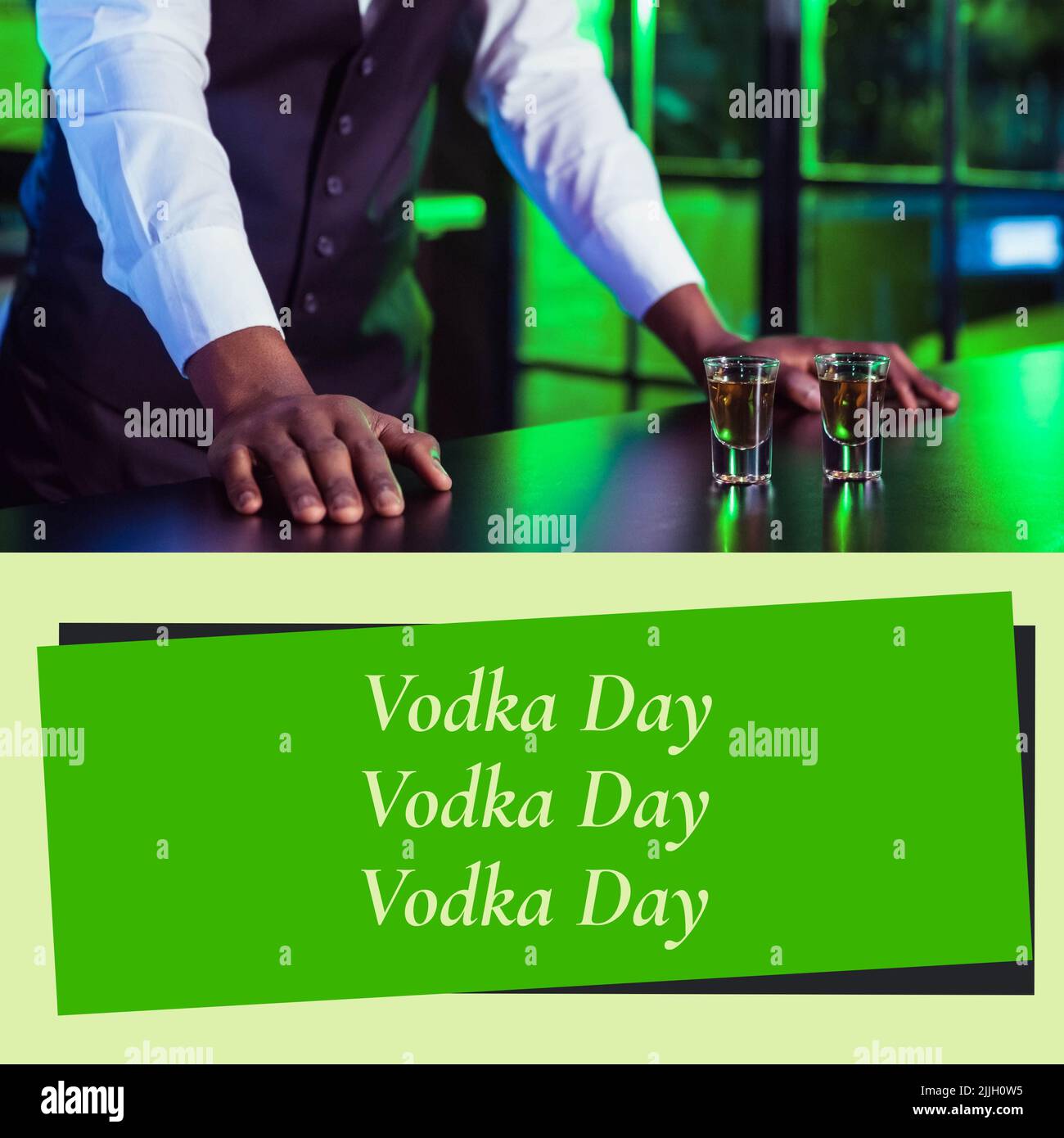 Composition of vodka day text over biracial male barman with shots Stock Photo