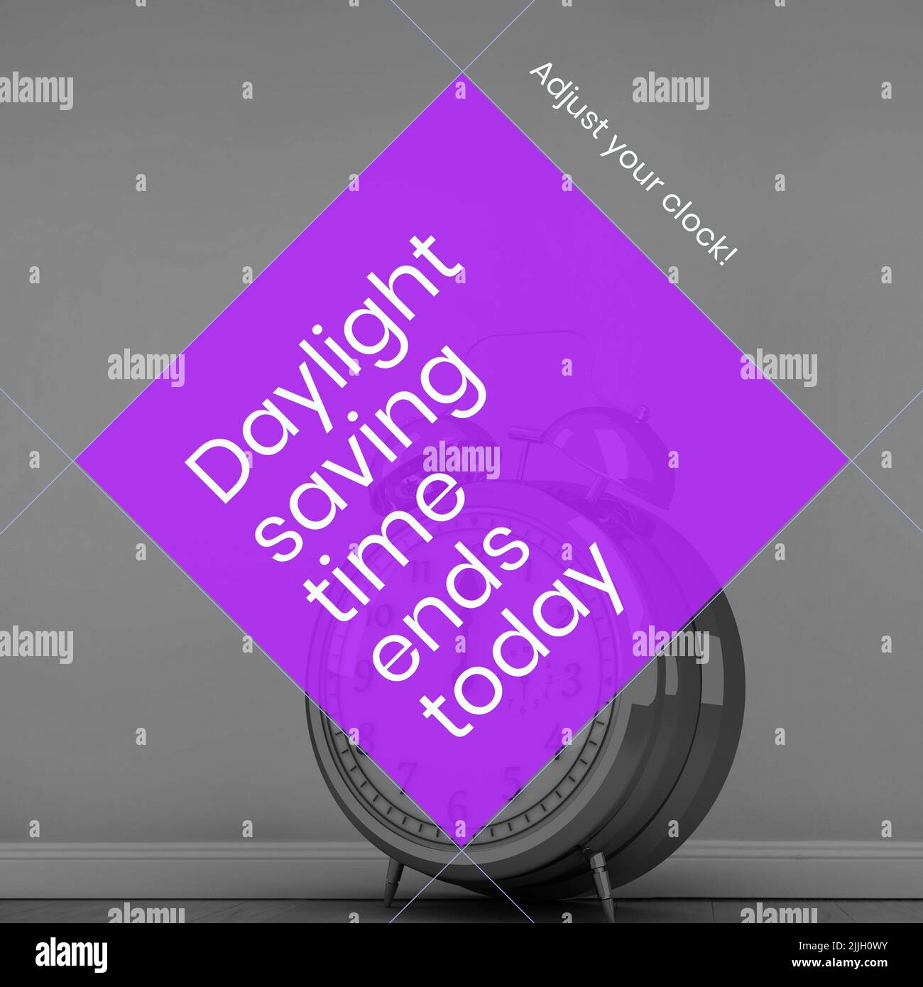 Composition of end of daylight saving time text over clock Stock Photo