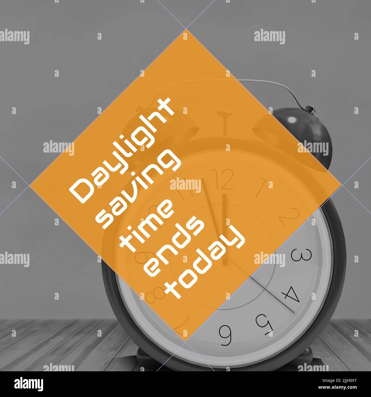 Composition of end of daylight saving time text over clock Stock Photo