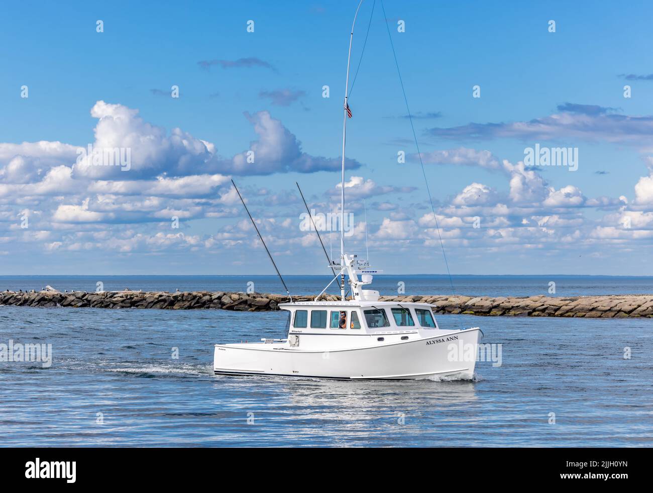 Fishing boat, Alyssa Ann returning to port in Montauk, NY Stock Photo