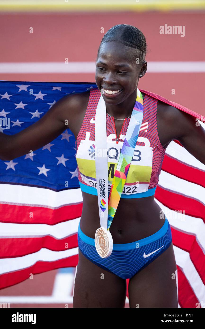 Athing Mu (USA) show off her gold medal after competing in the women’s