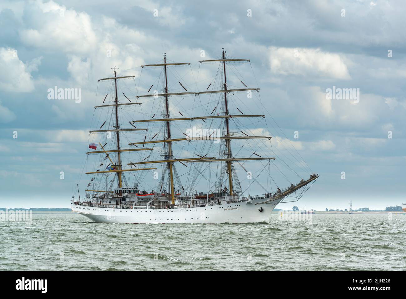 Tall ships race 2022. Polish Dar Mlodziezy on the Western Scheldt estuary (Netherlands) on its way from Antwerp (Belgium) to Aalborg (Denmark) Stock Photo