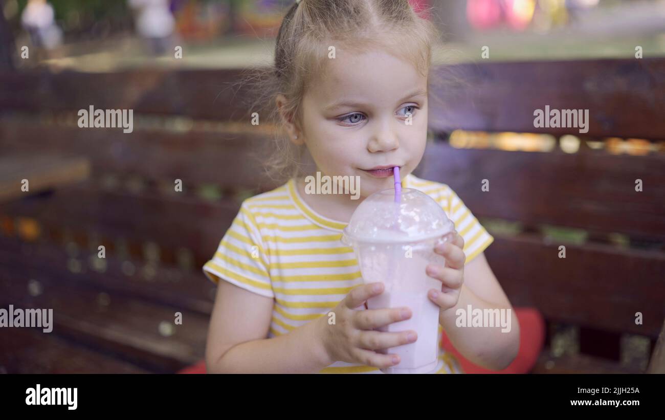 Child drinking outside hi-res stock photography and images - Alamy