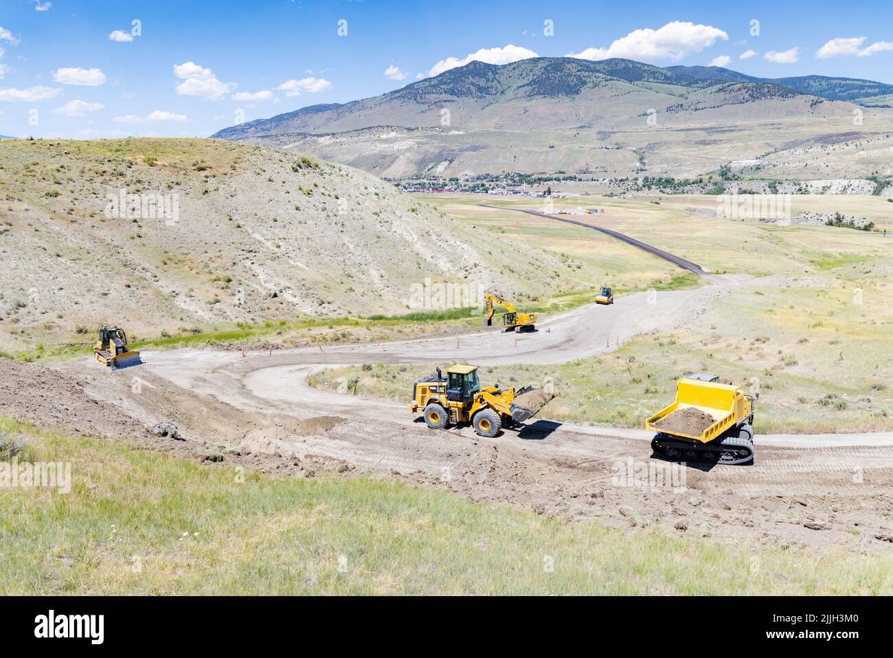 Mammoth Hot Springs, United States of America. 20 July, 2022. National Park Service workers improve sections of the Old Gardiner Road at the North Entrance of Yellowstone National Park, July 20, 2022 in Mammoth Hot Springs, Montana. The old dirt road will now allow visitors to enter the park after the main roads were destroyed in flooding cutting off the northern entrance and the tourist town of Gardiner.  Credit: Jacob W. Frank/NPS/Alamy Live News Stock Photo