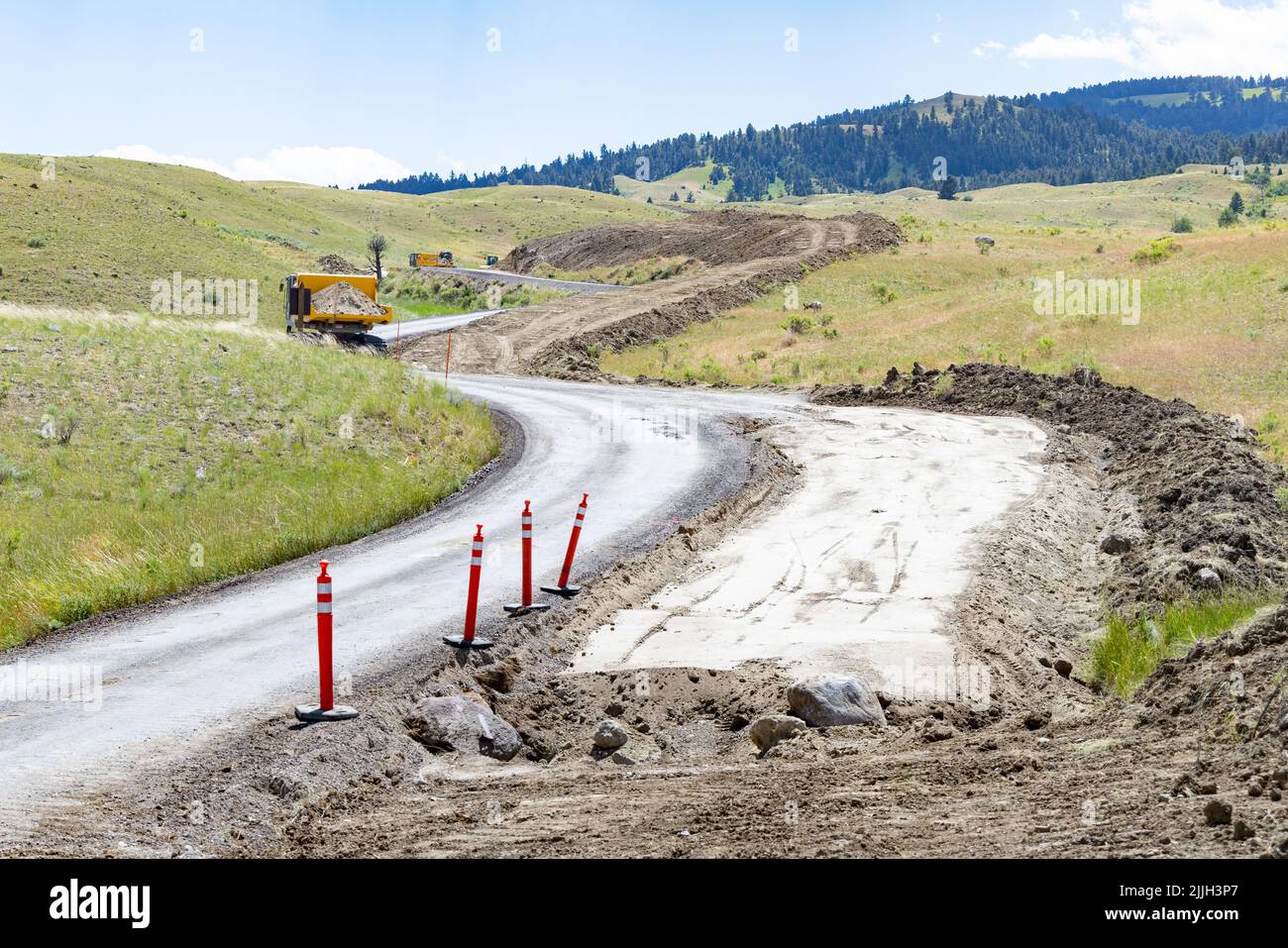 Mammoth Hot Springs, United States of America. 20 July, 2022. National Park Service workers improve sections of the Old Gardiner Road at the North Entrance of Yellowstone National Park, July 20, 2022 in Mammoth Hot Springs, Montana. The old dirt road will now allow visitors to enter the park after the main roads were destroyed in flooding cutting off the northern entrance and the tourist town of Gardiner.  Credit: Jacob W. Frank/NPS/Alamy Live News Stock Photo