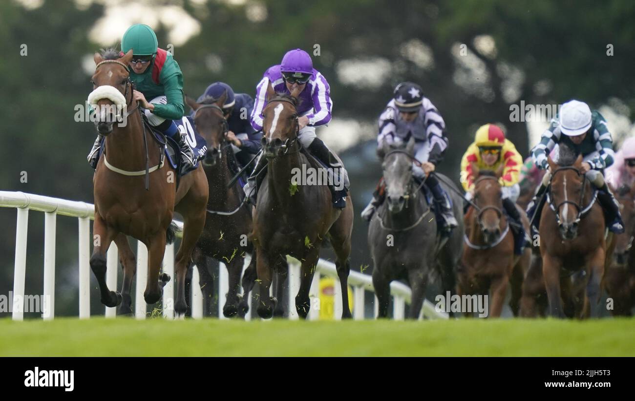 Tahiyra ridden by Chris Hughes (left) wins the third race during day two of the Galway Races Summer Festival 2022 at Galway Racecourse in County Galway, Ireland. Picture date: Tuesday July 26, 2022. Stock Photo