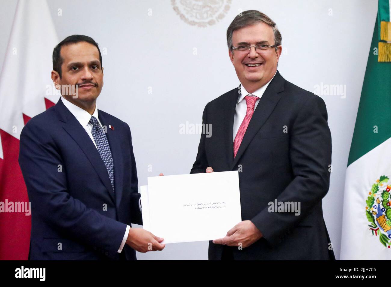 Qatar’s Foreign Minister, Mohammed bin Abdulrahman bin Jassim Al Than, and Mexico’s Foreign Minister, Marcelo Ebrard, pose for a photo after they addressed the media at the Foreign Ministry Building (SRE) in Mexico City, Mexico, July 26, 2022. REUTERS/Edgard Garrido Stock Photo