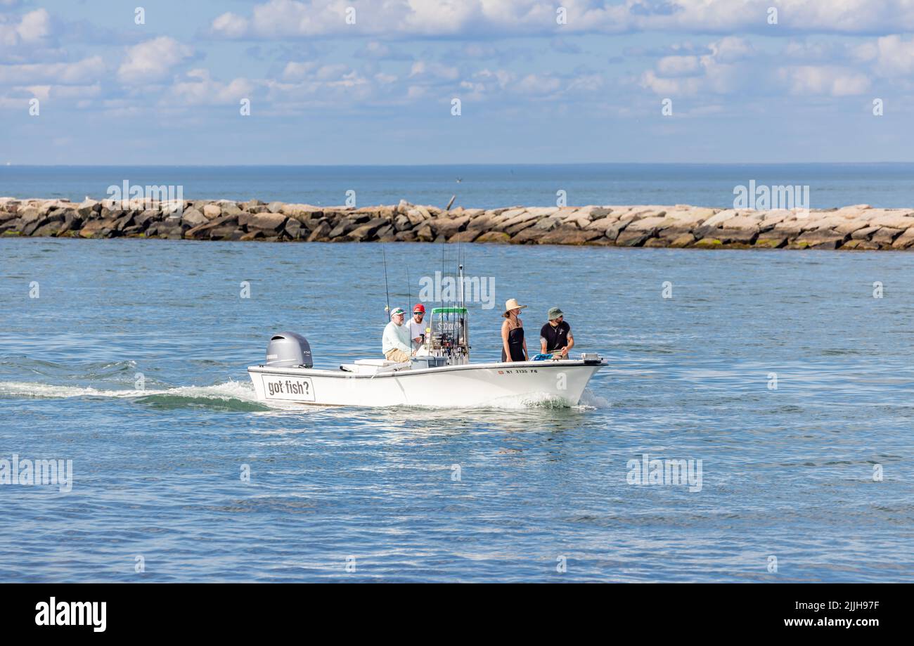 Small motor boat, Got Fish, coming into Montauk Harbor Stock Photo