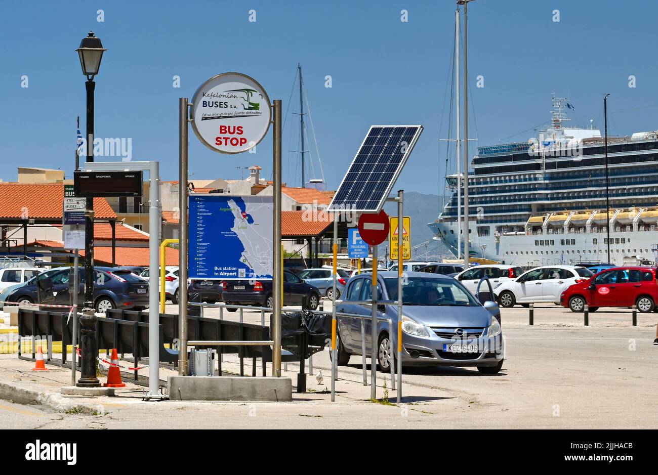 Argostili, Kefalonia, Greece - June 2022: Sign showing visitors the site of the town's main bus stop at the harbour Stock Photo