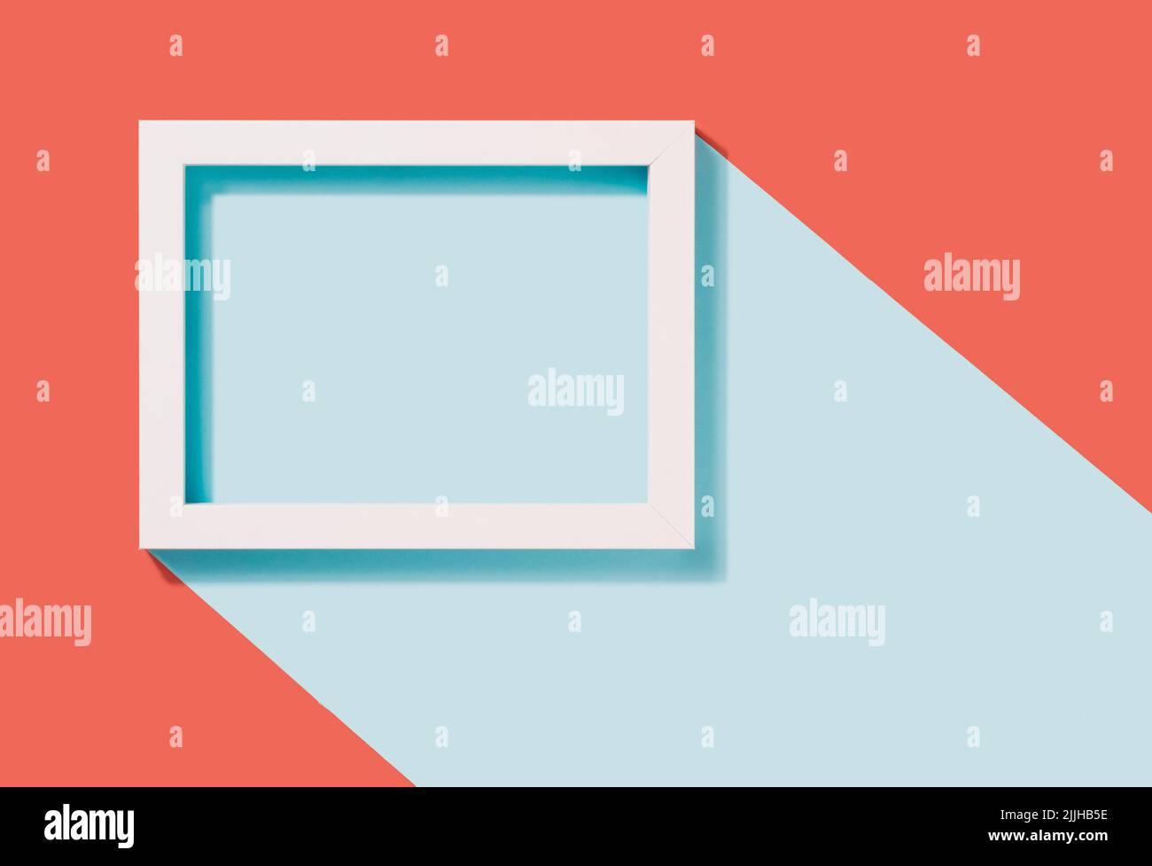 White rectangle frame on a two tone pastel background. Geometric minimal copy space. Stock Photo