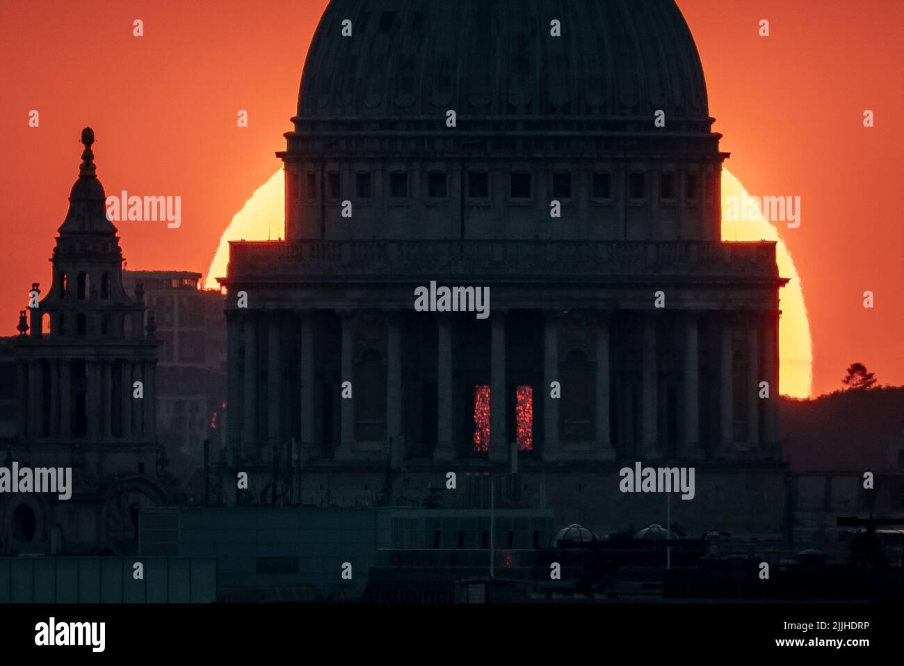 London, UK. 26th July, 2022. UK Weather: Dramatic evening sunset behind St. Paul's Cathedral. Credit: Guy Corbishley/Alamy Live News Stock Photo