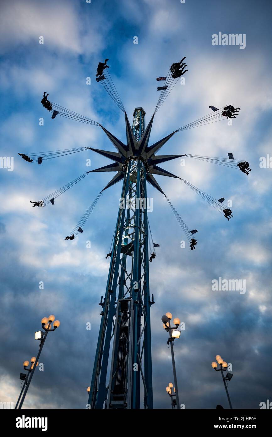 A bottom view of an attraction in the Hoppings on the Town Moor under a foggy sky Stock Photo